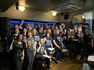 Indie Choir Harrow on stage at The Star pub in South Harrow
